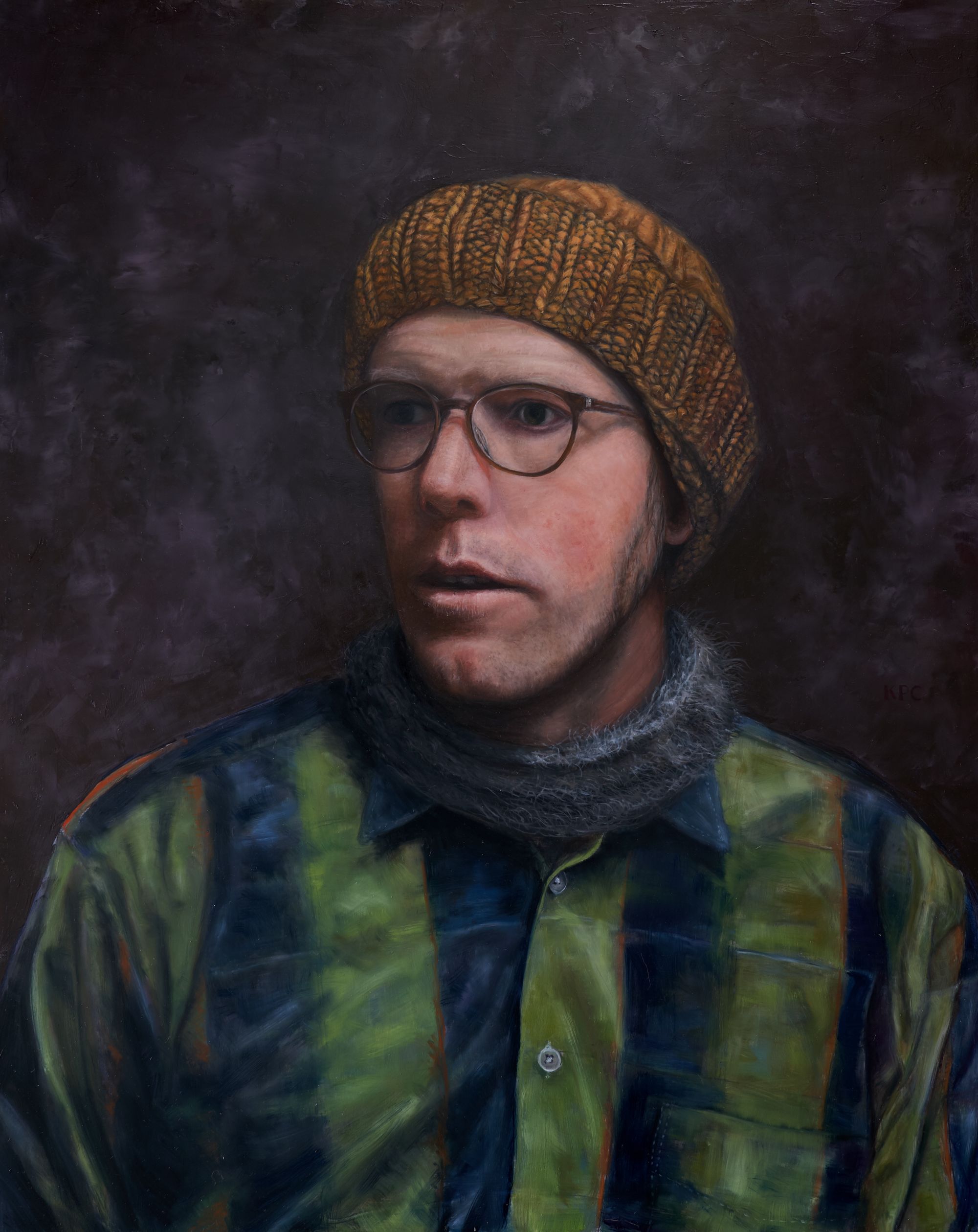 A self portrait by Kyle Parker Cunningham gazing left wearing a yellow knit hat, scarf and green shirt. 