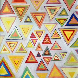 a painting multicolored equilaterral triangles interspersed some pointing up and some down. 