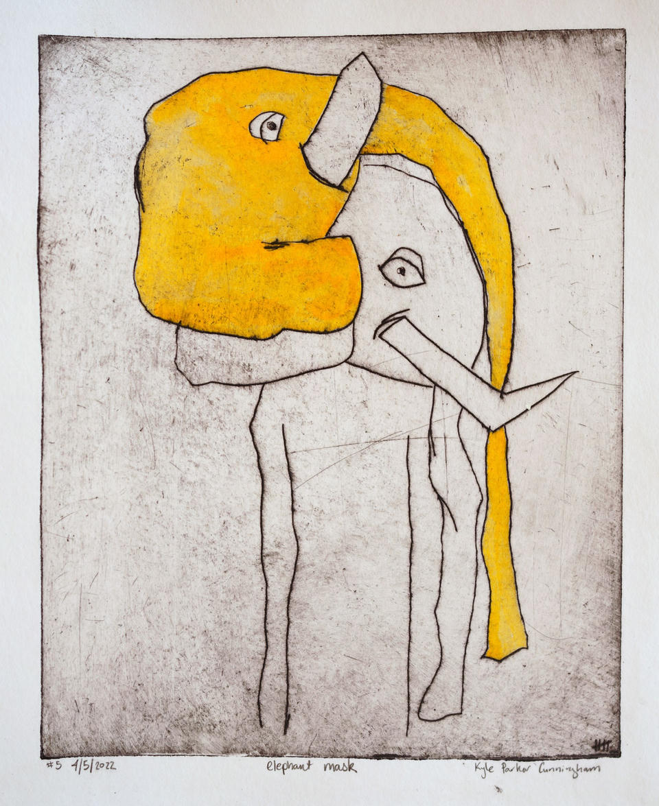 Alternate print of the elephant mask figure, showing subtle variation in the hand-applied yellow coloring across the mask and trunk against the softly inked gray background.